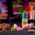 Various synthetic drugs in front of a colorful blurred background